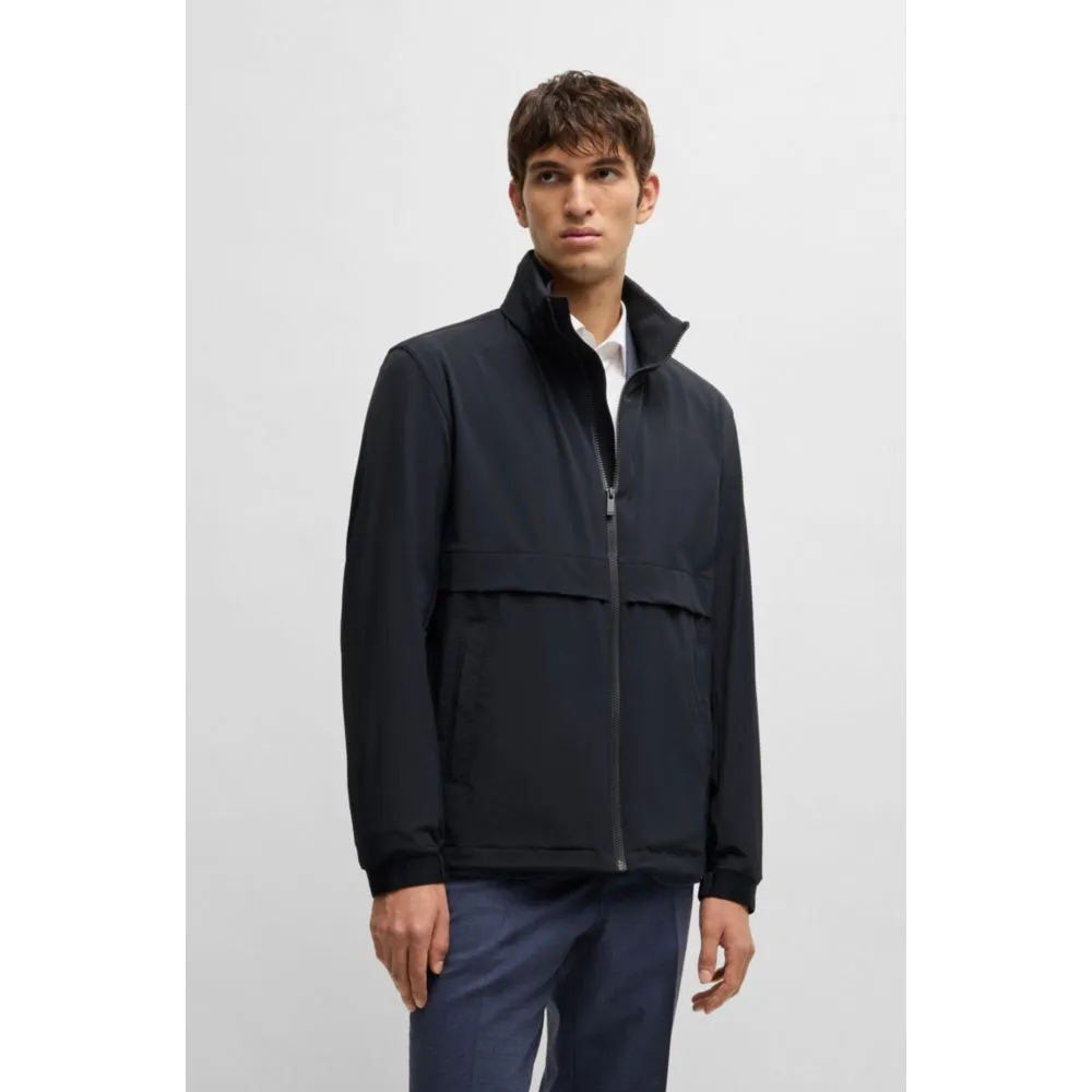 Softshell jacket in washable stretch fabric with packable hood